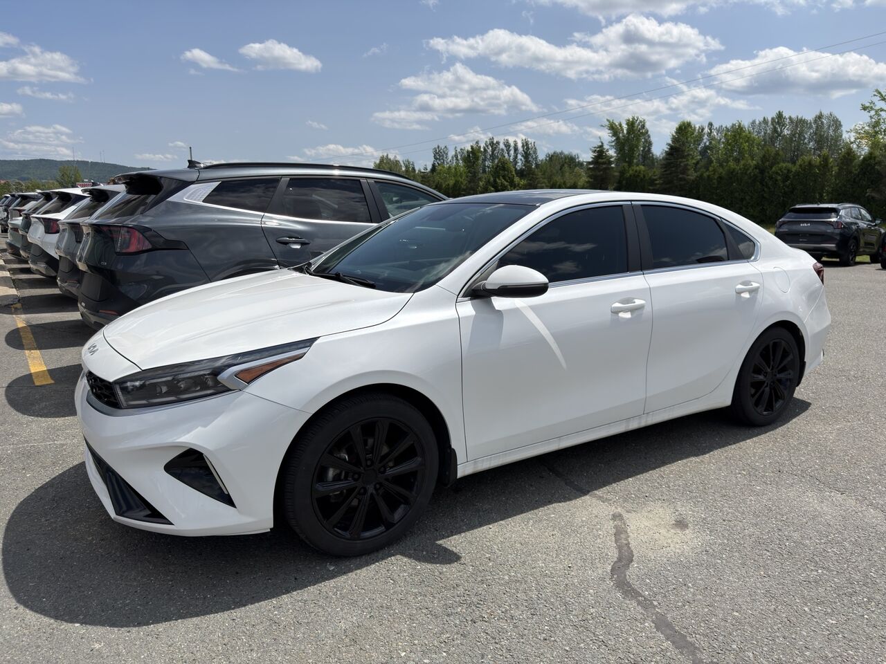 White 2024 Kia Forte Sedan Continuously Variable Transmission