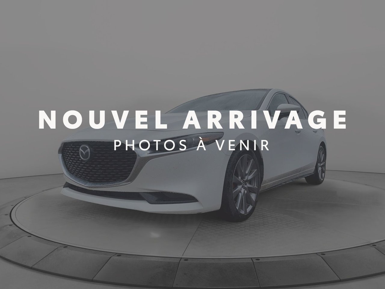 2019 Mazda Mazda3 VIN JM1BPBDM5K1116028 White Baie-Comeau - photo #0