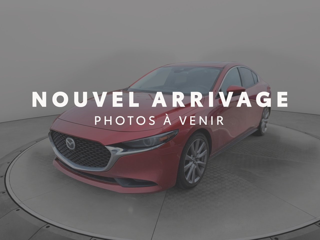 2019 Mazda Mazda3 VIN JM1BPBDM0K1121945 Red Chicoutimi - photo #0